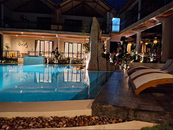 Swimming pool lounge beds at Bella Vida Resort Uluwatu Bali